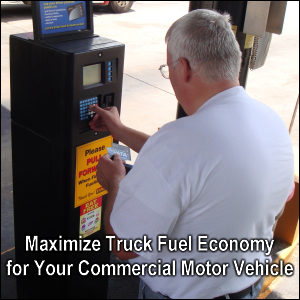 Maximize Truck Fuel Economy for Your Commercial Motor Vehicle. Professional truck driver Mike Simons enters info in the pump at a truck stop in preparation for putting fuel in the truck he drives.