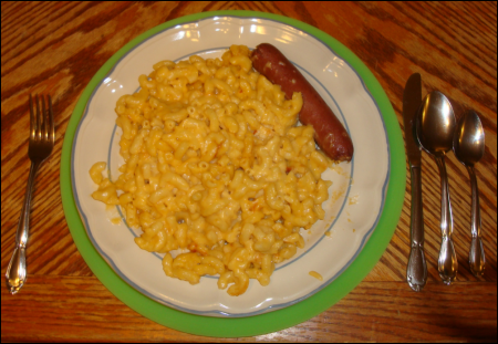 A lime green Micro Easy Grab serving as a placemat under a plateful of food hot from the microwave.