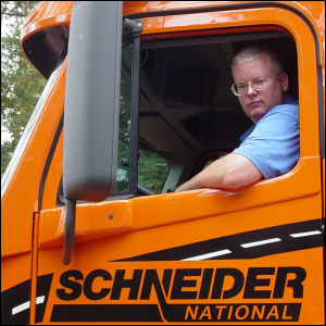 Mike Simons sitting in the truck he drove for Schneider National.