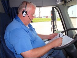 Professional truck driver Mike Simons uses his hands-free Blueparrot Roadwarrior Bluetooth Noise Cancelling Headset.