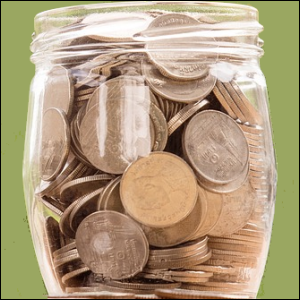 Jar containing coins, representing savings.