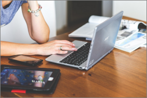 Woman doing research on a computer.