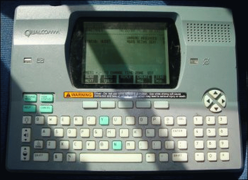 Front of a QualComm satellite communications unit in a truck.