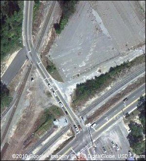 Google satellite image of an intersection in Aiken County, SC, with two railroad crossings.