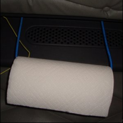 Paper towels on a stretch cord or tie down and hung from the bottom of the top bunk in a truck.