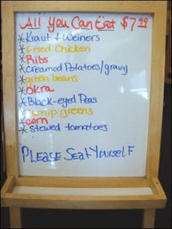 Written menu of entrees and hot vegetables at the North 40 Truck Stop restaurant.