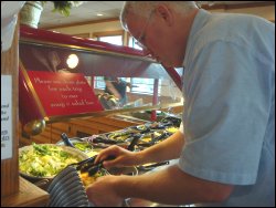 Professional driver Mike Simons visits the salad bar at the Petro restaurant in Glendale, KY.