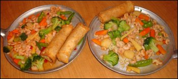 Our two plates of custom-made stir fry, hot out of the pan, from the stir fry buffet at the Petro Iron Skillet at Bordentown, NJ.