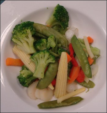 The re-order of 'stir-fry' vegetables (which looked and tasted like they were steamed) that Vicki got from the Buckhorn Restaurant at the Paulsboro Travel Plaza in Paulsboro, NJ. She used a little of the butter that had come on the side for her baked potato on these.