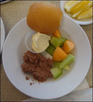 Vicki's bowl of fruit, dessert, roll and butter at the Country Pride Restaurant at the TA in Wheeling, WV.