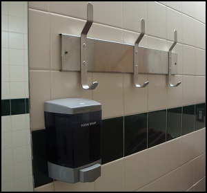 The three towel hooks on the far side of the mirror over the sink in Shower #7 at the Flying J in Kenly, NC.