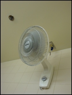 The fan is mounted near the ceiling in Shower #7 at the Flying J in Kenly, NC.