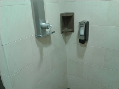 View of shower control, soap holder and soap dispenser in shower stall at Flying J in Hudson (Roberts) Wisconsin