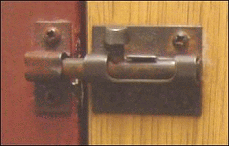 The sliding lock on the back of the door of Shower #1 at the Pilot in Pleasant Hill, NC.