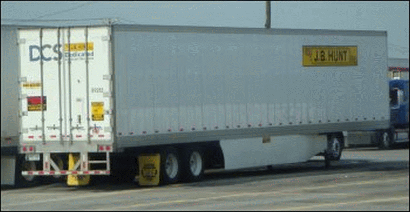 J.B. Hunt trailer with a side skirt air fairing.