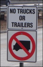 Sign stating 'No Trucks or Trailers.'