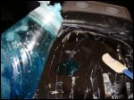 A dab of blue Dawn dishwashing liquid has been added to the electric skillet for washing dishes in a truck.