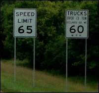 A split speed limit for trucks lower than max speed for other vehicles.
