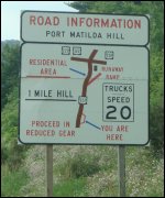 Road sign advising truck drivers of steep grade near Port Matilda Hill.