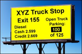 Billboard advertising XYZ Truck Stop with open truck parking spaces.