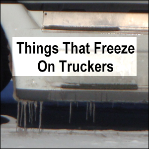 Things that freeze on truckers. Photo of icicles hanging from the lower step on a tractor.