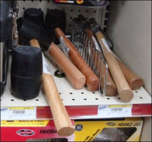 Rubber mallets and metal headed hammers on sale at a truckstop.