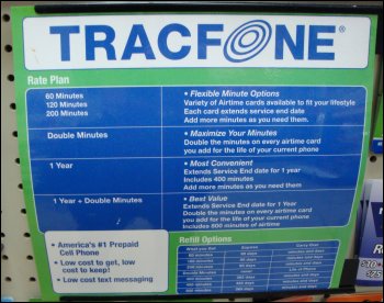 A sign showing the highlights of the TracFone prepaid cell phone service.