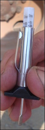 Tread depth gauge showing inches as expressed in 32nds.