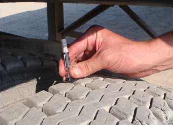 Measuring tread on the inside of the tire.