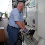 Mike Simons putting fuel in his Epes Transport company truck