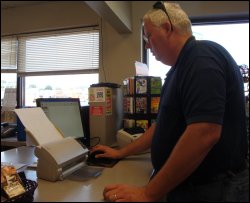 Mike Simons using TripPak Express to scan in documents from one trip.