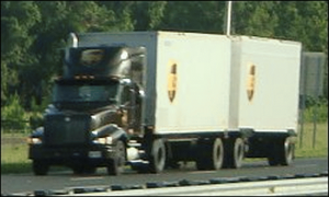 Double trailers often contain LTL freight, pulled by someone with a local truck driving job.