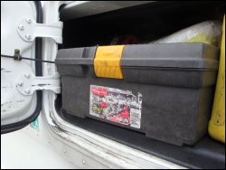 Mike stored his kingpin lock inside his tool box, which he stored in the side box of his tractor.