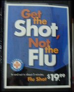 Photo of a poster reading Get the Shot, Not the Flu with the symbol for Roadside Medical.