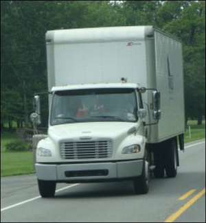 A straight truck can be driven by someone with a local truck driving job.