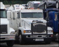 Truck teeth bug screen: Jaws on a tractor pulling a tanker