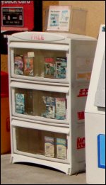 Trucking magazine rack or display at a truck stop.