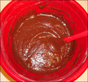 View of Brownie Mix with other ingredients before being poured into a baking pan.