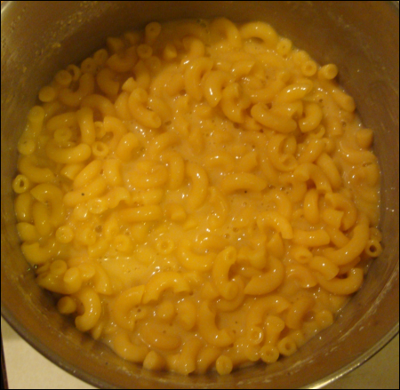 Photo of cooked Cheesy Mac in the pot. Notice that not all of the water has been absorbed.