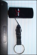 A direct computer connection where a Verizon Wireless Mobile Broadband modem is plugged directly into a laptop computer, without a USB extension cable.