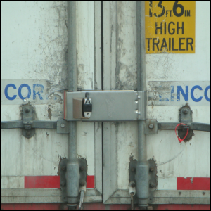 Bar lock attached to two inner bars on trailer doors. Acts as a trailer door lock.